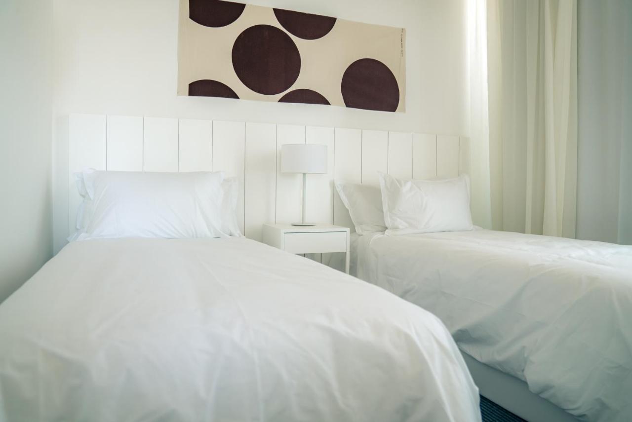 Casagrande Hotel & Beach Club Jose Ignacio  Ngoại thất bức ảnh A bedroom with two single beds